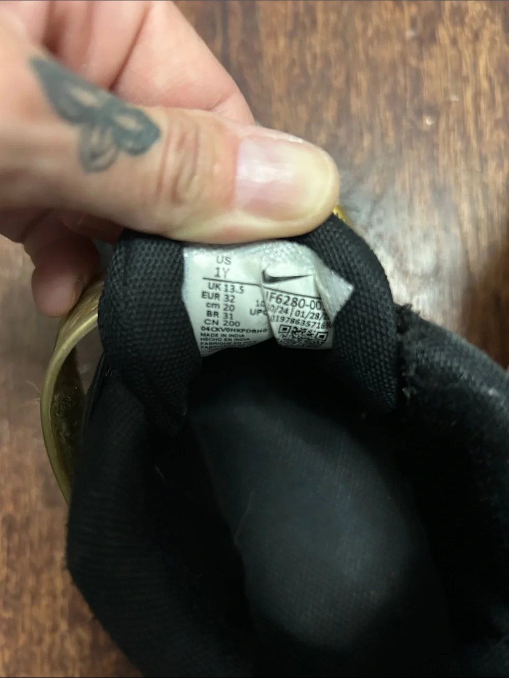 Nike Kids Black and Gold Strap Sneakers